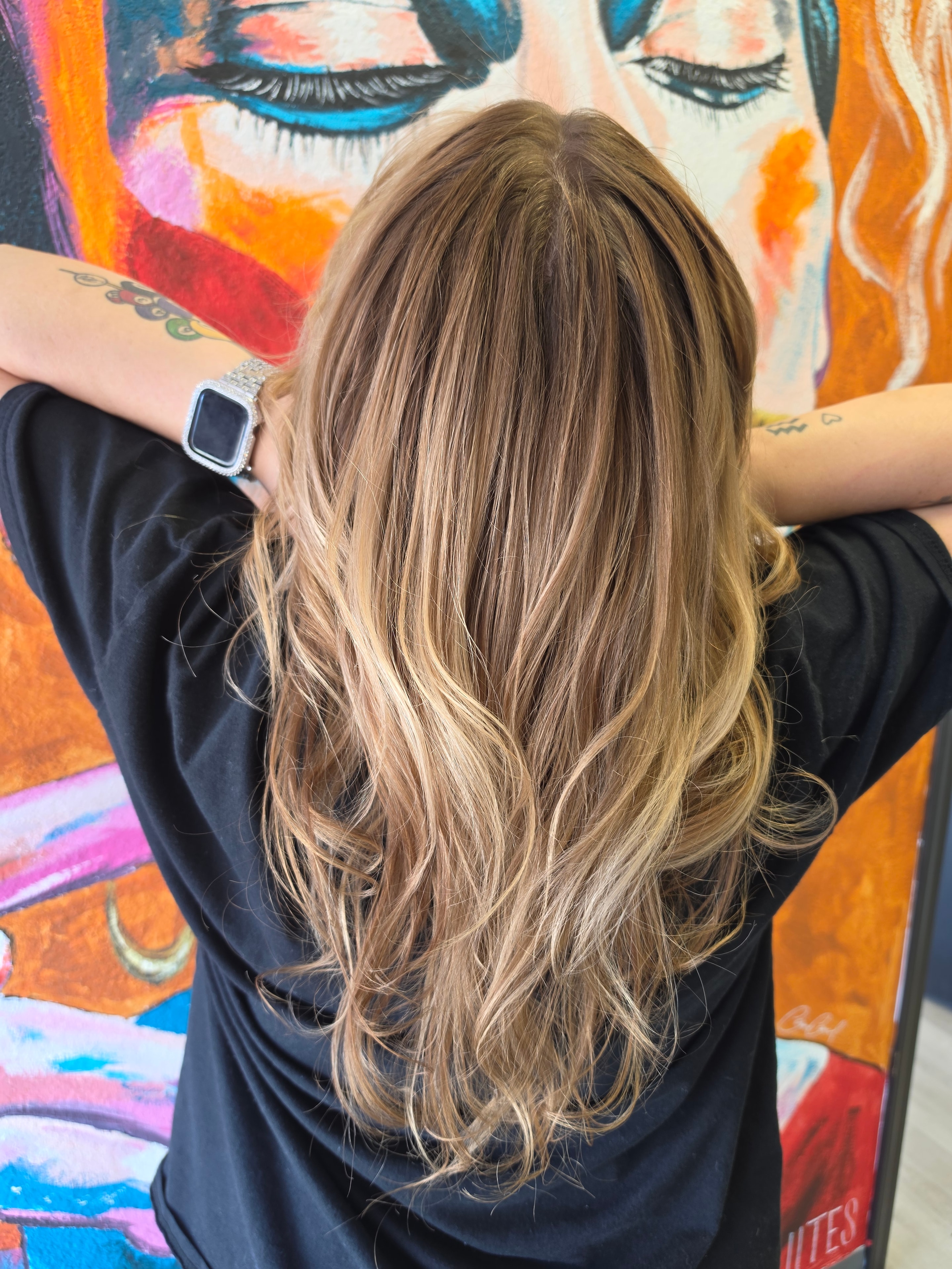 Dimensional blonde highlights with soft waves